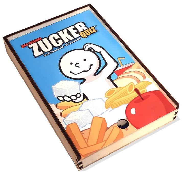 The game box of the Zucker-Quiz with the smiling sugar figure on the lid